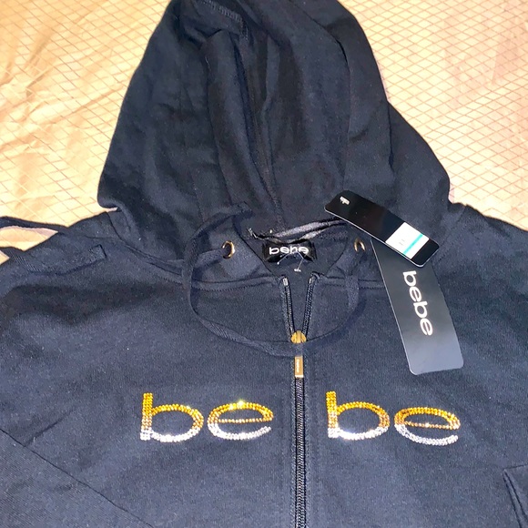 bebe Jackets & Blazers - BeBe studded Jet black zip up hoodie, Large, brand new, excellent condition 🍁